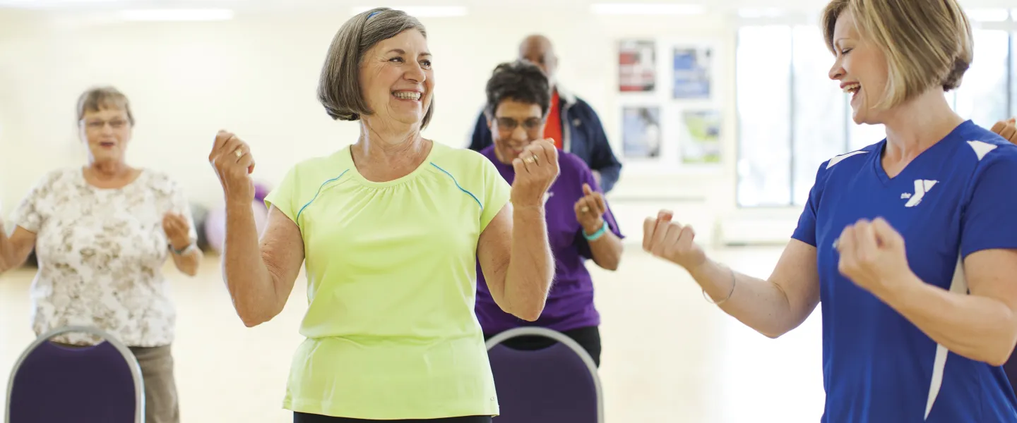 Seniors taking a Group Exercise class