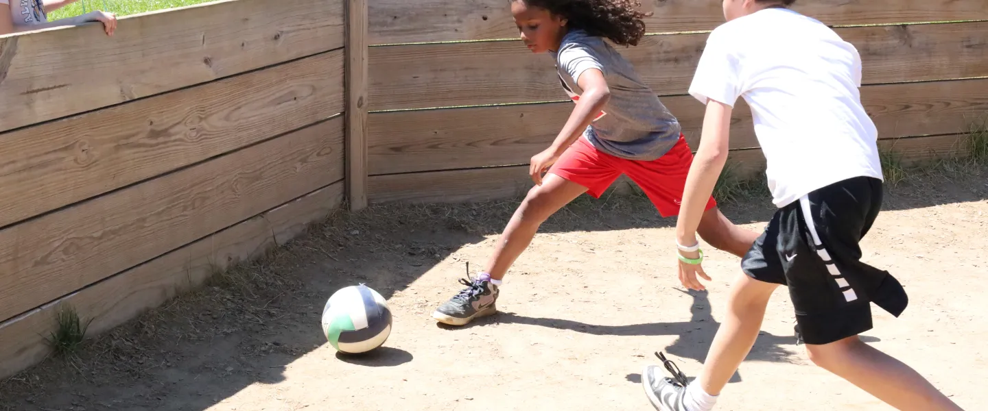 Two boys playing Gaga Ball