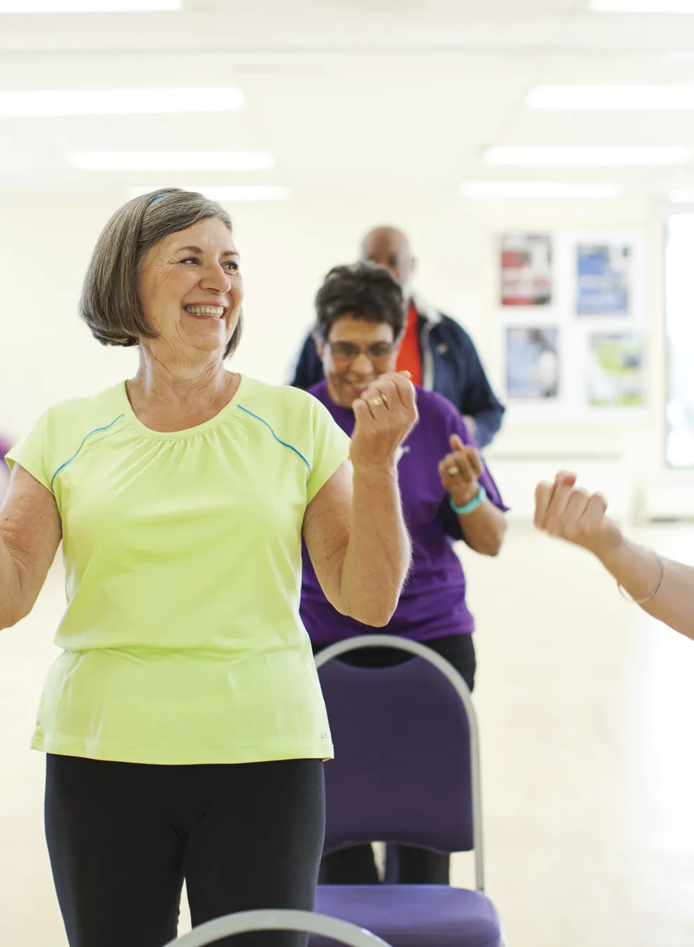 Seniors taking a Group Exercise class