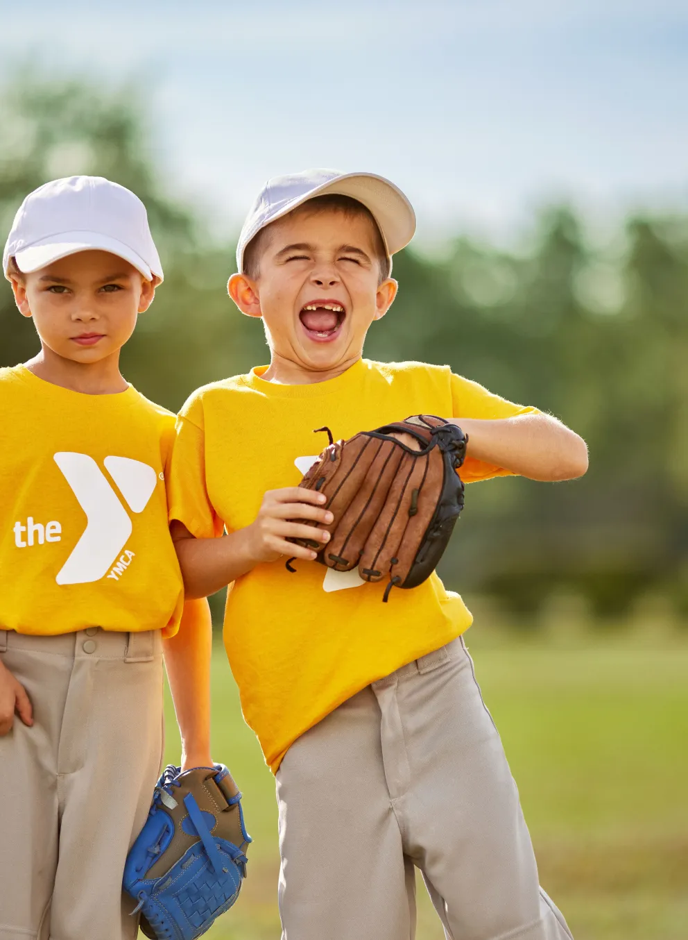Two kids playing baseball