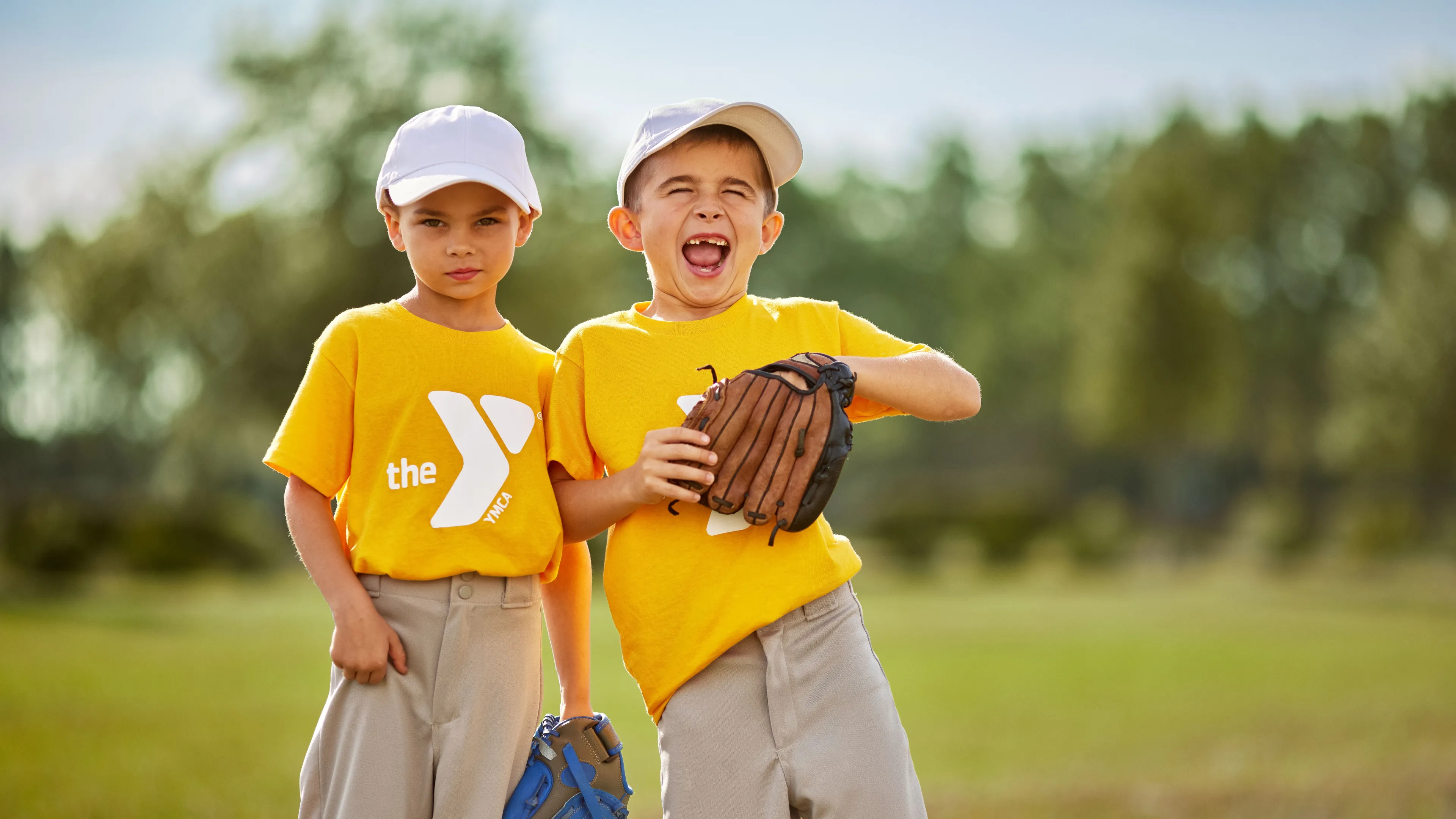 Two kids playing baseball