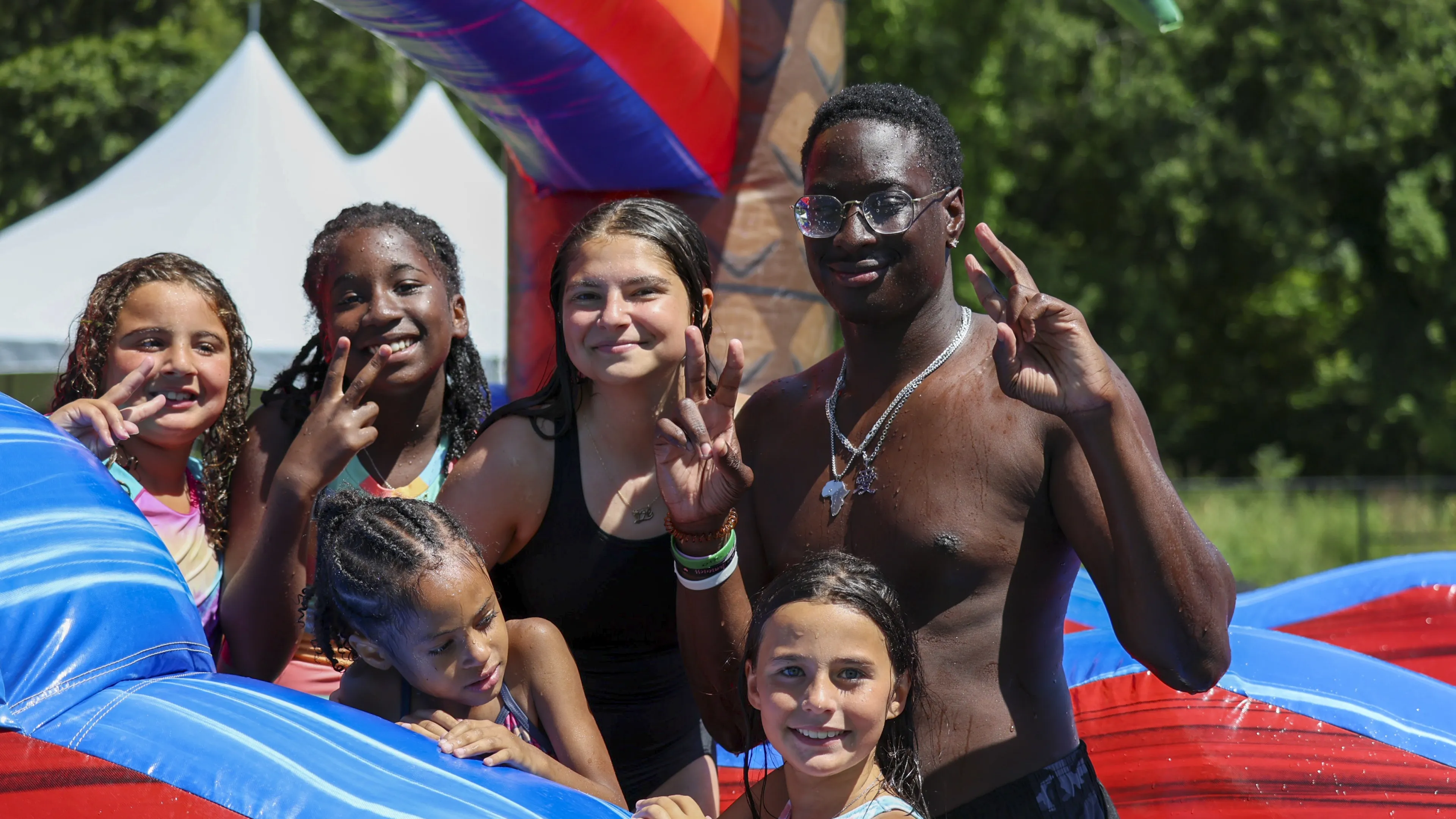 Counselors and campers smiling