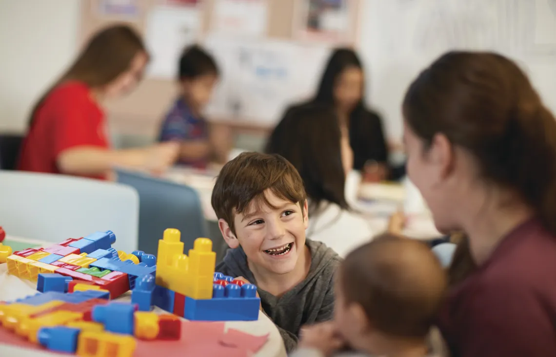 Boy playing with legos