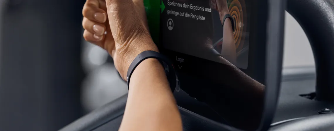 Person connecting their band to screen